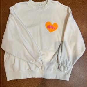 Cozy White Sweater with Orange Heart by [Brand]